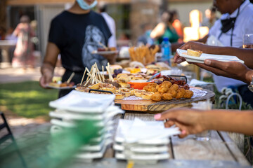 A Variety of snacks  canape served outside