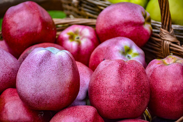 some red apples in basket, ripe apples closeup