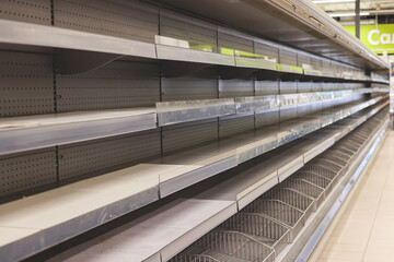 View of empty supermarket shelves, grocery store work stoppage closes, sanctions and embargo, panic...