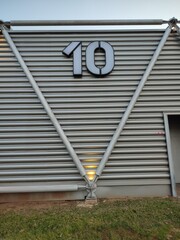 garage door number ten, metal background 