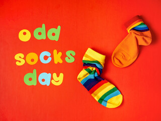 Odd Socks Day. Lonely Sock Day. The social problem of bullying. Strange socks as a symbol of Down...