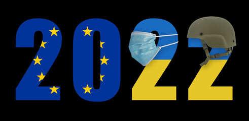 2022 in a mask from a covid and in a helmet with the flag of Ukraine and the European Union