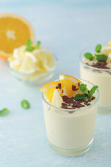 Orange lemon citrus milk mousse in glasses