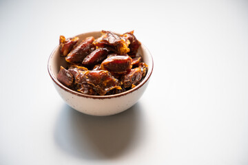 dates in a bowl for eid mubarak
