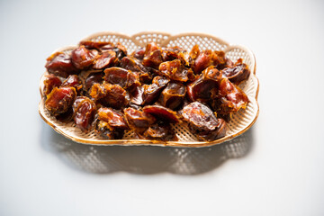 dates in a bowl for eid mubarak