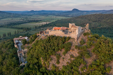 Fototapeta na wymiar Aerial view of Szigliget castle near Lake Balaton in Hungary after closing hours before the sun sets
