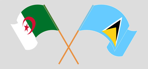 Crossed and waving flags of Algeria and Saint Lucia