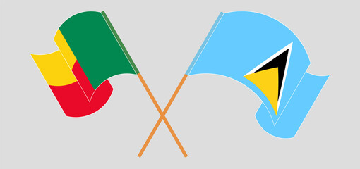 Crossed and waving flags of Benin and Saint Lucia
