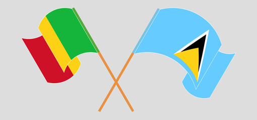 Crossed and waving flags of Mali and Saint Lucia