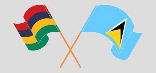 Crossed and waving flags of Mauritius and Saint Lucia