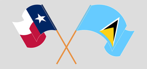 Crossed and waving flags of the State of Texas and Saint Lucia