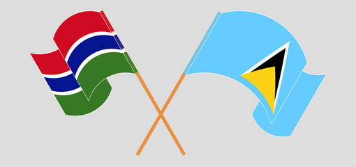 Crossed and waving flags of the Gambia and Saint Lucia