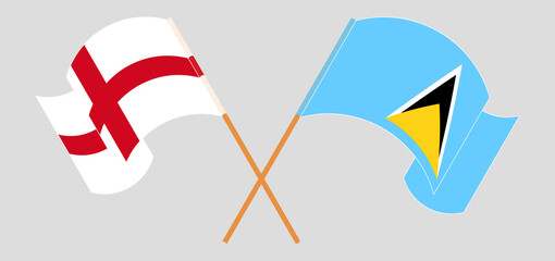 Crossed and waving flags of England and Saint Lucia