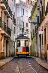 Naklejka na ściany i meble Vertical view of Traditional tram 28 in Lisbon. Portugal