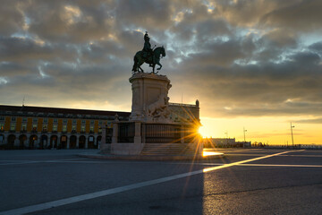 Commerce Square (Praca do Comercio) at sunrise with statue of of King Jose I in Lisbon. Portugal