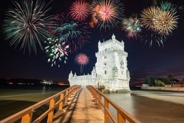 Belem Tower with fireworks. New Year's eve celebration in Lisbon, Portugal