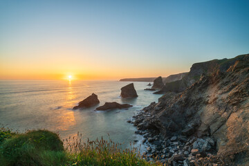 Sunset at Bedruthan Steps cliffs, North Cornwall, UK