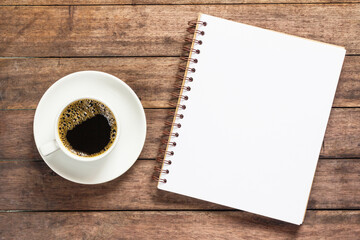 Fototapeta na wymiar Blank notebook on the coffee table