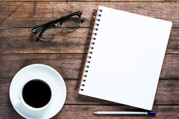 Blank notebook with pencil on the table old wood.