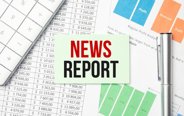pen, calculator and glasses on grey background. Business concept. White paper sheet with News Report