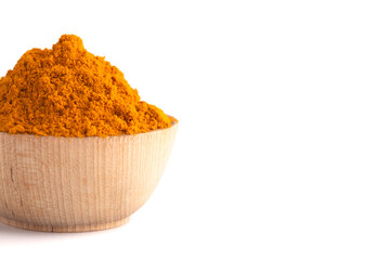 A Bowl of Ground Turmeric Powder on a White Background