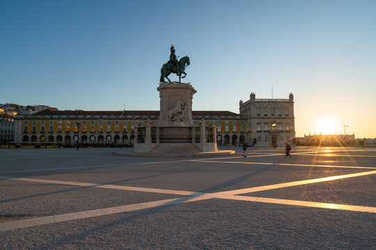 Commerce Square (Praca do Comercio) at sunrise with statue of of King Jose I in Lisbon. Portugal