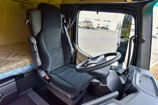 Mercedes-Benz Actros F. Economical tractor for truck transport. Cabin interior - comfortable driver's seat. 10-12-21, Prague, Czech Republic.