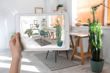 Interior of light office with modern workplace and houseplants