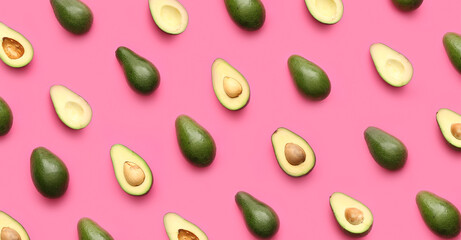 Many ripe avocados on pink background