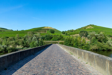  Luitpold bridge over river Nahe in Oberhausen with vineyards and blue sky