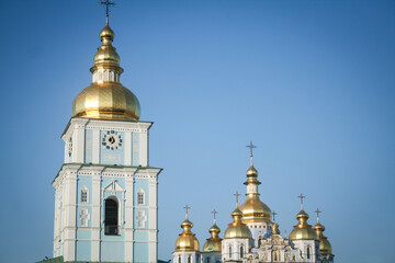 Fototapeta na wymiar Saint Sophia cathedral Church in kyiv Ukraine, with its orthodox cross and golden cupolas. Also called sofiiskyi sobor, it is an iconic ukrainian orthodox church and a symbol of orthodoxy....