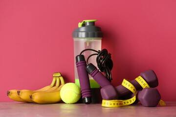 Stylish sport equipment on pink background - Powered by Adobe