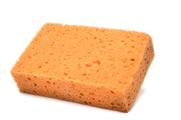 Closeup cuboid orange sponge cleaning white background