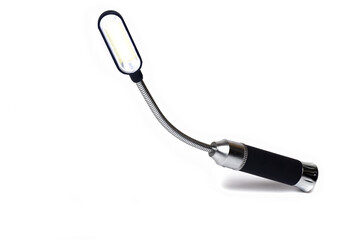 LED working flashlight magnetic base white background