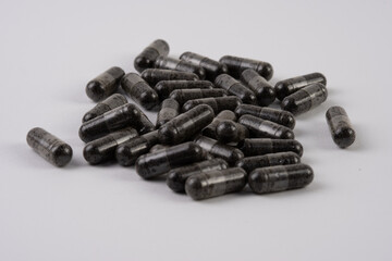 capsule of Nigella sativa ( black caraway, black cumin, black seed ), herbal capsules from...