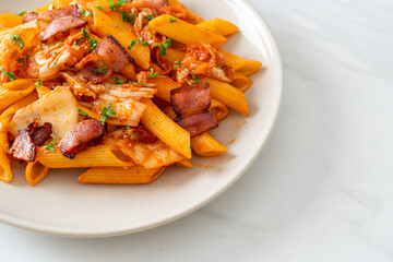 stir-fried penne pasta with kimchi and bacon