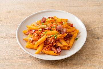 stir-fried penne pasta with kimchi and bacon