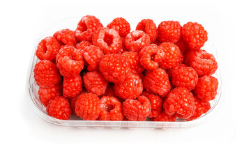 Fresh Organic Ripe Raspberry in plastic container, isolated on white background with clipping path	
