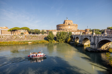 Landscape of Tiber river and Castle of the Holy Angel in Rome. Traveling Italy concept. Idea of...
