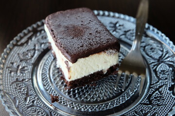 Dairy free ice cream in a container, selective focus. That is ice not grain. Pieces of ice cream cake with vanilla and cocoa. It is called "Dondurma" or "Dondurma Sandvic" in Turkish. Summer food.
