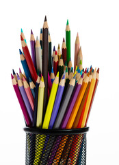 Colorful pencils in metal basket on white background