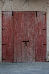 old wooden door red texture closed
