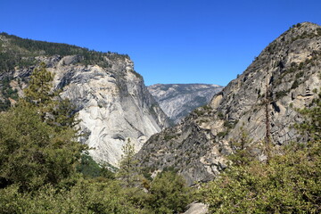 The Merced River flows at the bottom of Tenaya Canyon in Yosemite National Park, California