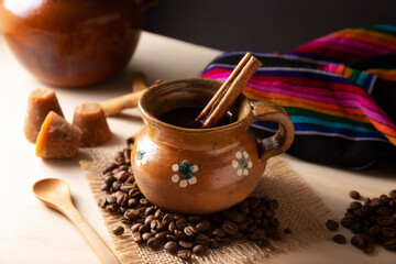 Cafe de Olla. Traditional Mexican coffee and basic ingredients for its preparation, coffee,...