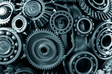 Abstract background of engine gears and bearings. The concept of production and teamwork.Selective focus.