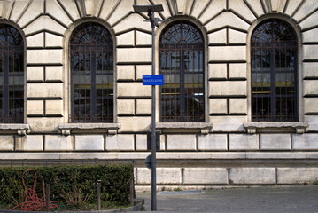 Blue sign at Place de la Madeleine at the old town of Lausanne on a sunny spring day. Photo taken March 18th, 2022, Lausanne, Switzerland.