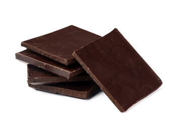 Small dark chocolate pieces isolated on white background