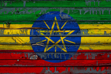 The national flag of Ethiopia. is painted on uneven boards. Country symbol.