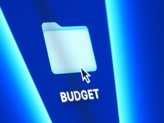 Budget - macro shot of folder on computer desktop with mouse pointer - zooming in on screen pixels