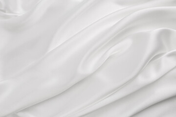 Fototapeta na wymiar Elegance white satin silk with waves, abstract background luxury cloth, elegant wallpaper design. Abstract background luxury cloth or liquid wave